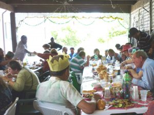 People enjoying Gethsemane Christmas dinner